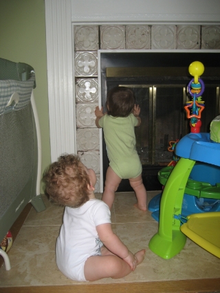 Playing by the fireplace